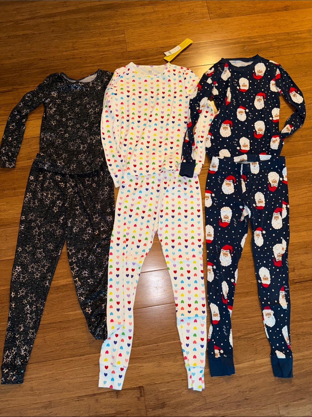 Girls pajama bundle various brands size 12 Santa, hearts, stars